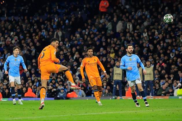 Manchester City v Real Madrid Champions League 11 02 2025. Jude Bellingham (5) of Real Madrid heads the ball goalwards during the Champions League match between Manchester City and Real Madrid at the Etihad Stadium, Manchester, England on 11 February 2025. Manchester Etihad Stadium Manchester England Editorial use only , Copyright: xConorxMolloyx PSI-21439-0040