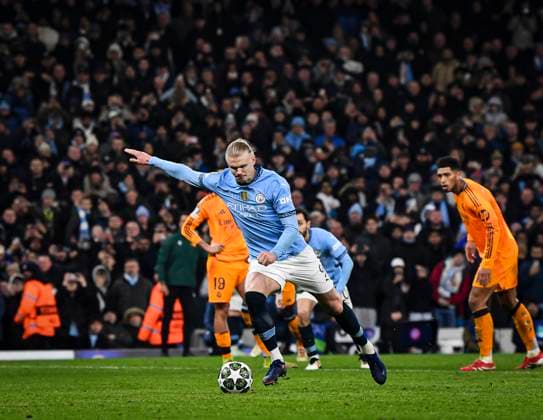 11th February 2025; Etihad Stadium, Manchester, England; UEFA Champions League Play Off Round 1 Football, Manchester City versus Real Madrid; Erling Haaland of Manchester City scores from the penalty spot in the 80th minute for 2-1  ActionPlus12749796 GodfreyxPitt