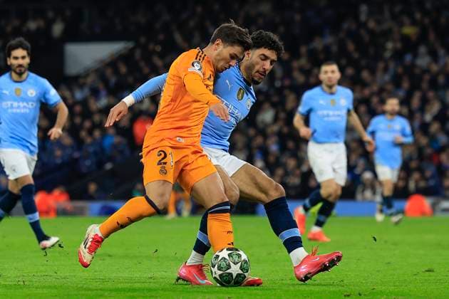 Manchester City v Real Madrid Champions League 11 02 2025. Brahim Diaz (21) of Real Madrid and Omar Marmoush (7) of Manchester City challenge for the ball during the Champions League match between Manchester City and Real Madrid at the Etihad Stadium, Manchester, England on 11 February 2025. Manchester Etihad Stadium Manchester England Editorial use only , Copyright: xConorxMolloyx PSI-21439-0087