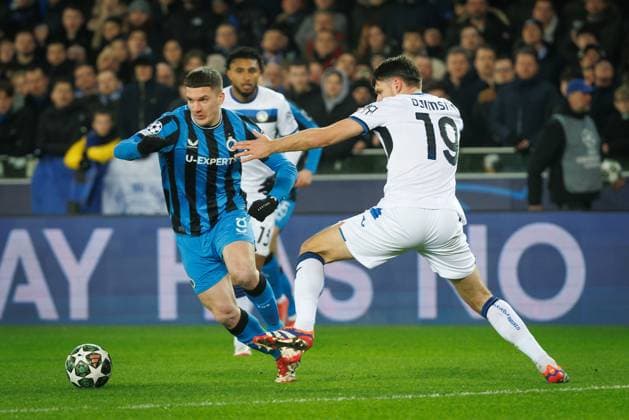Club s Christos Tzolis and Atalanta s Berat Djimsiti fight for the ball during a soccer game between Belgian soccer team Club Brugge KV and Italian club Atalanta Bergamo, on Wednesday 12 February 2025 in Brugge, in the first leg of the Knockout phase play-offs of the UEFA Champions League competition. KURTxDESPLENTER  x112320642x