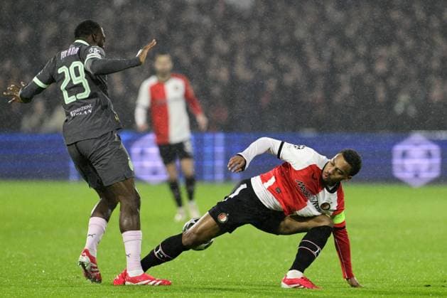 ROTTERDAM - (l-r) Youssouf Fofana of AC Milan, Quinten Timber of Feyenoord during the UEFA Champions League playoff match between Feyenoord and AC Milan at Feyenoord Stadion de Kuip on Feb. 12, 2025 in Rotterdam, Netherlands. ANP OLAF CRACK UEFA Champions League 2024 25 League Knockout Play-off First Leg 2024 25 xVIxANPxSportx xxANPxIVx 519820140 originalFilename: 519820140.jpg