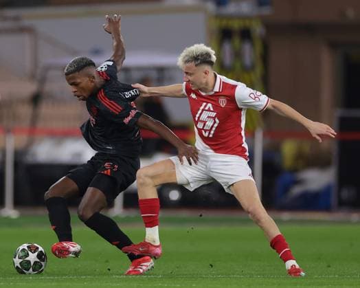 Monaco, Monaco, 12th February 2025. Aleksandr Golovin of AS Monaco tussles with Florentino of SL Benfica during the UEFA Champions League match at Stade Louis II, Monaco. Picture credit should read: Simon Bellis Sportimage EDITORIAL USE ONLY. No use with unauthorised audio, video, data, fixture lists, club league logos or live services. Online in-match use limited to 120 images, no video emulation. No use in betting, games or single club league player publications. SPI_003_JM_MONACO_BENFICA_UCL_ SPI-3662-0003