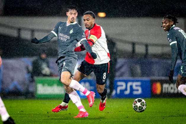 AC Milan midfielder Tijjani Reijnders, Feyenoord Rotterdam midfielder Quinten Timber during the match Feyenoord - AC Milan at the Stadium De Kuip for the UEFA Champions League- Knockout phase play- offs1st leg season 2024-2025 in ROTTERDAM, Netherlands on 12 february 2025, (photo by Marcel van Dorst EYE4images DeFodi Images) Defodi-746_215367