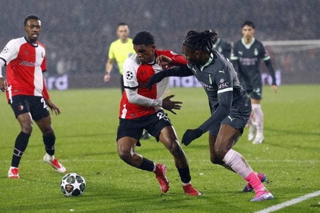 ROTTERDAM - (l-r) Givairo Read of Feyenoord, Rafael LeoÂ£o of AC Milan during the UEFA Champions League playoff match between Feyenoord and AC Milan at Feyenoord Stadion de Kuip on Feb. 12, 2025 in Rotterdam, Netherlands. ANP SEM VAN DER WAL UEFA Champions League 2024 25 League Knockout Play-off First Leg 2024 25 xVIxANPxSportx xxANPxIVx 519823034 originalFilename: 519823034.jpg