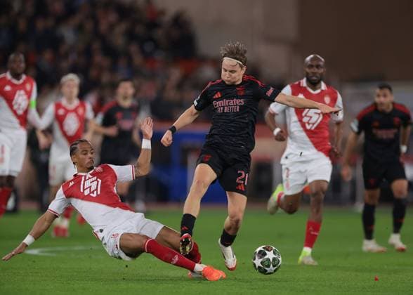 Monaco, Monaco, 12th February 2025. Jan Thilo Kehrer of AS Monaco challenges Andreas Schjelderup of SL Benfica during the UEFA Champions League match at Stade Louis II, Monaco. Picture credit should read: Simon Bellis Sportimage EDITORIAL USE ONLY. No use with unauthorised audio, video, data, fixture lists, club league logos or live services. Online in-match use limited to 120 images, no video emulation. No use in betting, games or single club league player publications. SPI_010_JM_MONACO_BENFICA_UCL_ SPI-3662-0010