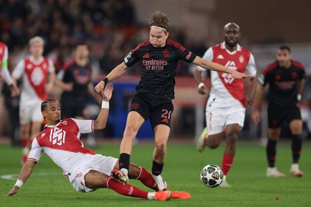 Monaco, Monaco, 12th February 2025. Jan Thilo Kehrer of AS Monaco challenges Andreas Schjelderup of SL Benfica during the UEFA Champions League match at Stade Louis II, Monaco. Picture credit should read: Simon Bellis Sportimage EDITORIAL USE ONLY. No use with unauthorised audio, video, data, fixture lists, club league logos or live services. Online in-match use limited to 120 images, no video emulation. No use in betting, games or single club league player publications. SPI_011_JM_MONACO_BENFICA_UCL_ SPI-3662-0011