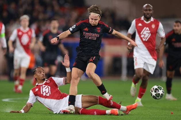 Monaco, Monaco, 12th February 2025. Jan Thilo Kehrer of AS Monaco challenges Andreas Schjelderup of SL Benfica during the UEFA Champions League match at Stade Louis II, Monaco. Picture credit should read: Simon Bellis Sportimage EDITORIAL USE ONLY. No use with unauthorised audio, video, data, fixture lists, club league logos or live services. Online in-match use limited to 120 images, no video emulation. No use in betting, games or single club league player publications. SPI_012_JM_MONACO_BENFICA_UCL_ SPI-3662-0012