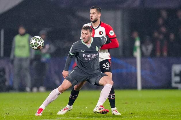 2025-02-12 Feyenoord v AC Milan - UEFA Champions League 2024 25 League Knockout Play-off First Leg ROTTERDAM, NETHERLANDS - FEBRUARY 12: Santiago Gimenez of AC Milan battles for possession with David Hancko of Feyenoord during the UEFA Champions League 2024 25 League Knockout Play-off First Leg match between Feyenoord and AC Milan at Stadion Feijenoord on February 12, 2025 in Rotterdam, Netherlands. Rotterdam Stadion Feijenoord Netherlands Content not available for redistribution in The Netherlands directly or indirectly through any third parties. Copyright: xJorisxVerwijstx