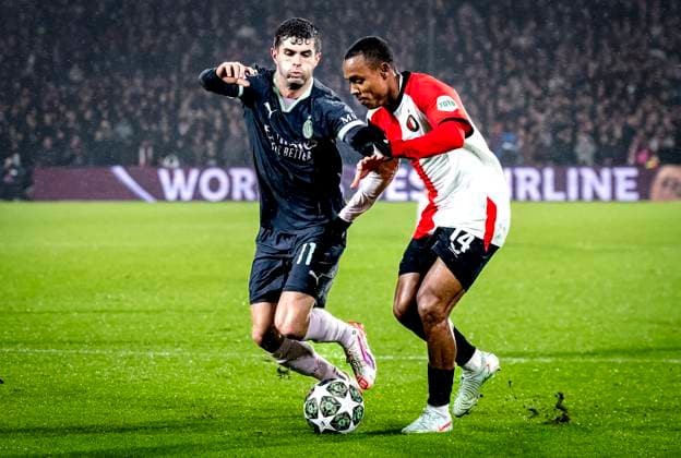 AC Milan forwarder Chrstian Pulisic, Feyenoord Rotterdam forwarder Igor Paixao during the match Feyenoord - AC Milan at the Stadium De Kuip for the UEFA Champions League- Knockout phase play- offs1st leg season 2024-2025 in ROTTERDAM, Netherlands on 12 february 2025, (photo by Marcel van Dorst EYE4images DeFodi Images) Defodi-746_215386