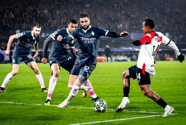 AC Milan defender Kyle Walker, Feyenoord Rotterdam forwarder Igor Paixao during the match Feyenoord - AC Milan at the Stadium De Kuip for the UEFA Champions League- Knockout phase play- offs1st leg season 2024-2025 in ROTTERDAM, Netherlands on 12 february 2025, (photo by Marcel van Dorst EYE4images DeFodi Images) Defodi-746_215396