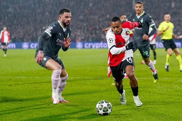 2025-02-12 Feyenoord v AC Milan - UEFA Champions League 2024 25 League Knockout Play-off First Leg ROTTERDAM, NETHERLANDS - FEBRUARY 12: Kyle Walker of AC Milan battles for possession with Igor Paixao of Feyenoord during the UEFA Champions League 2024 25 League Knockout Play-off First Leg match between Feyenoord and AC Milan at Stadion Feijenoord on February 12, 2025 in Rotterdam, Netherlands. Rotterdam Stadion Feijenoord Netherlands Content not available for redistribution in The Netherlands directly or indirectly through any third parties. Copyright: xJorisxVerwijstx
