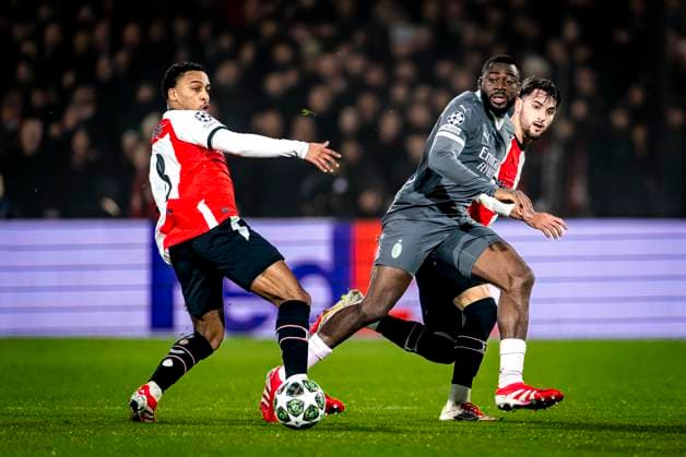 Feyenoord Rotterdam midfielder Quinten Timber, AC Milan midfielder Youssouf Fofane, Feyenoord Rotterdam forwarder Julian Carranza during the match Feyenoord - AC Milan at the Stadium De Kuip for the UEFA Champions League- Knockout phase play- offs1st leg season 2024-2025 in ROTTERDAM, Netherlands on 12 february 2025, (photo by Marcel van Dorst EYE4images DeFodi Images) Defodi-746_215413