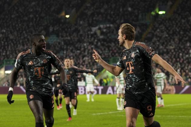 Harry Kane of Bayern Munich celebrates with Dayot Upamecano of Bayern Munich after scoring to give Bayern Munich a 0-2 lead Celtic v Bayern Munich, UEFA Champions League, Knockout Round Play-offs, First Leg, Football, Celtic Park, Glasgow, UK - 12 Feb 2025 EDITORIAL USE ONLY No use with unauthorised audio, video, data, fixture lists, club league logos or live services. Online in-match use limited to 120 images, no video emulation. No use in betting, games or single club league player publications. Copyright: xStuartxWallace Shutterstockx 15136907cz