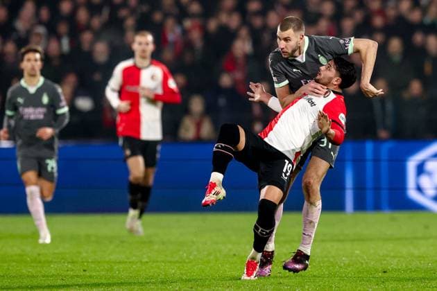 2025-02-12 Feyenoord v AC Milan - UEFA Champions League 2024 25 League Knockout Play-off First Leg ROTTERDAM, NETHERLANDS - FEBRUARY 12: Julian Carranza of Feyenoord battles for possession with Strahinja Pavlovic of AC Milan during the UEFA Champions League 2024 25 League Knockout Play-off First Leg match between Feyenoord and AC Milan at Stadion Feijenoord on February 12, 2025 in Rotterdam, Netherlands. Rotterdam Stadion Feijenoord Netherlands Content not available for redistribution in The Netherlands directly or indirectly through any third parties. Copyright: xPieterxvanxderxWoudex
