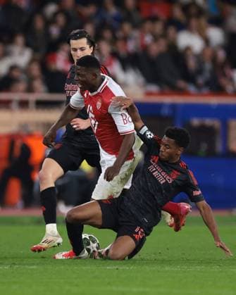Monaco, Monaco, 12th February 2025. Leandro Barreiro of SL Benfica and Alvaro Carreras of SL Benfica challenge Breel Embolo of AS Monaco during the UEFA Champions League match at Stade Louis II, Monaco. Picture credit should read: Simon Bellis Sportimage EDITORIAL USE ONLY. No use with unauthorised audio, video, data, fixture lists, club league logos or live services. Online in-match use limited to 120 images, no video emulation. No use in betting, games or single club league player publications. SPI_046_JM_MONACO_BENFICA_UCL_ SPI-3662-0046