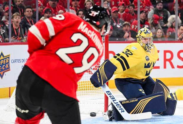 February 12, 2025, Montreal, Pq, Canada: Canada s Nathan MacKinnon (29) scores against Sweden goaltender Filip Gustavsson during first period 4 Nations Face-Off hockey action in Montreal, Wednesday, February 12, 2025. Filip Gustavsson, Nathan MacKinnon,  - ZUMAc35_ 20250212_zaf_c35_110 Copyright: xGrahamxHughesx