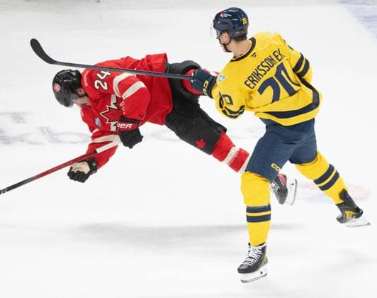 February 12, 2025, Montreal, Pq, CANADA: Canada forward Seth Jarvis (24) is upended by Sweden forward Joel Eriksson Ek (20) during first period 4 Nations Face-Off hockey action in Montreal on Wednesday, Feb. 12, 2025. Canada News - February 12, 2025  - ZUMAc35_ 20250212_zaf_c35_109 Copyright: xChristinnexMuschix