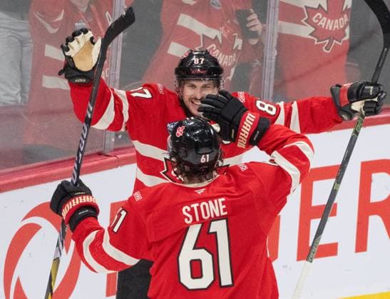 February 12, 2025, Montreal, Pq, CANADA: Canada forward Mark Stone (61) celebrates his goal over Sweden with teammate Sidney Crosby (87) during second period 4 Nations Face-Off hockey action in Montreal on Wednesday, Feb. 12, 2025. Canada News - February 12, 2025  - ZUMAc35_ 20250212_zaf_c35_133 Copyright: xChristinnexMuschix
