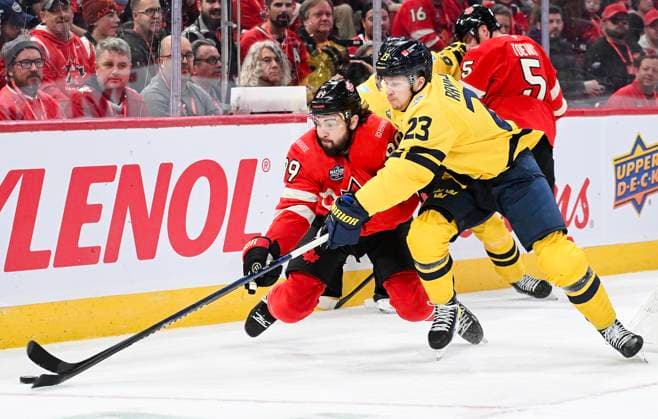 February 12, 2025, Montreal, Pq, Canada: Canada s Drew Doughty (89) defends against Sweden s Lucas Raymond (23) during second period 4 Nations Face-Off hockey action in Montreal, Wednesday, February 12, 2025. Drew Doughty, Lucas Raymond,  - ZUMAc35_ 20250212_zaf_c35_134 Copyright: xGrahamxHughesx