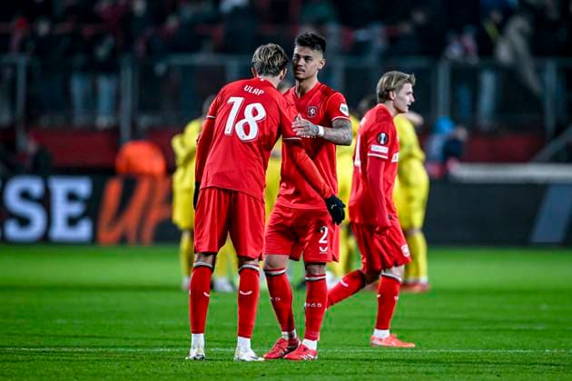 FC Twente midfielder Michel Vlap, FC Twente defender Mees Hilgers, during the match Twente - Bodo Glimt at the Grolsch Veste, FC Twente Stadion for the UEFA Europa League - Knockout phase play-offs - 1st leg season 2024-2025 in ENSCHEDE, Netherlands on 13 februari 2025, (photo by Stefan Koops EYE4images DeFodi Images) Defodi-746_215921
