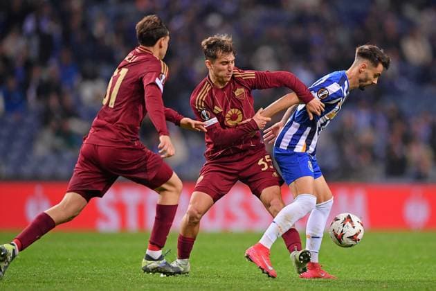 13th February 2025: Porto, Portugal: Dragao Stadium, UEFA Europa League 2024 2025, FC Porto versus Roma; Fabio Vieira of FC Porto keeps possession from Tommaso Baldanzi of Roma, during the Play-off first leg of UEFA Europa League 2024 2025 at Dragao Stadium in Porto on February 13, 2025.  ActionPlus12750252 DanielxCastro