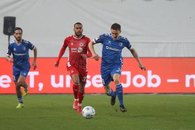 14.02.2025, xgox, Fussball 2. Bundesliga, 1. FC Magdeburg - 1. FC Koeln emspor, v.l. Linton Maina (Koeln, 37), Martijn Kaars (Magdeburg, 9) (DFL DFB REGULATIONS PROHIBIT ANY USE OF PHOTOGRAPHS as IMAGE SEQUENCES and or QUASI-VIDEO) Magdeburg