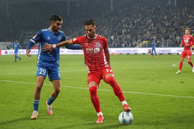 14.02.2025, xgox, Fussball 2. Bundesliga, 1. FC Magdeburg - 1. FC Koeln emspor, v.l. Livian Burcu (Magdeburg, 29), Leart Pacarada (Koeln, 17) (DFL DFB REGULATIONS PROHIBIT ANY USE OF PHOTOGRAPHS as IMAGE SEQUENCES and or QUASI-VIDEO) Magdeburg
