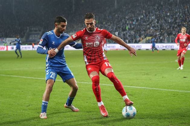 14.02.2025, xgox, Fussball 2. Bundesliga, 1. FC Magdeburg - 1. FC Koeln emspor, v.l. Livian Burcu (Magdeburg, 29), Leart Pacarada (Koeln, 17) (DFL DFB REGULATIONS PROHIBIT ANY USE OF PHOTOGRAPHS as IMAGE SEQUENCES and or QUASI-VIDEO) Magdeburg