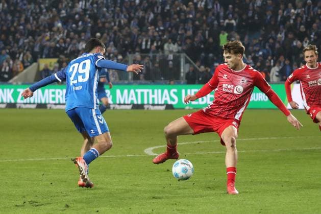 14.02.2025, xgox, Fussball 2. Bundesliga, 1. FC Magdeburg - 1. FC Koeln emspor, v.l. Livian Burcu (Magdeburg, 29), Jan Thielmann (Koeln, 29) (DFL DFB REGULATIONS PROHIBIT ANY USE OF PHOTOGRAPHS as IMAGE SEQUENCES and or QUASI-VIDEO) Magdeburg