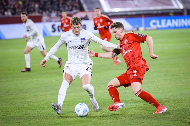 2. Fussball Bundesliga, Fortuna Düsseldorf vs. Hertha BSC Berlin, 15.02.2025 Moritz Heyer (Fortuna Düsseldorf 5) und Mickael Cuisance (Hertha BSC Berlin 27) -- DFL REGULATIONS PROHIBIT ANY USE OF PHOTOGRAPHS AS IMAGE SEQUENCES AND OR Q?UASI-VIDEO. - 2. Fussball Bundesliga, Fortuna Düsseldorf vs. Hertha BSC Berlin, 15.02.2025