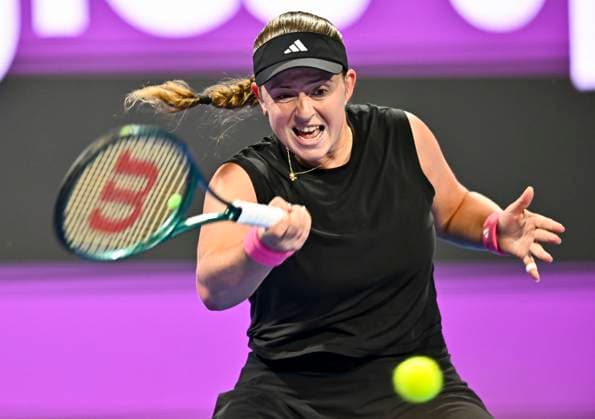 (250216) -- DOHA, Feb. 16, 2025 -- Jelena Ostapenko of Latvia hits a return during the women s singles final match between Jelena Ostapenko of Latvia and Amanda Anisimova of the United States at the WTA, Tennis Damen Qatar Open tennis tournament in Doha, Qatar, on Feb. 15, 2025. (Photo by Xinhua) (SP)QATAR-DOHA-WTA QATAR OPEN 2025-WOMEN S SINGLES FINAL Nikku 