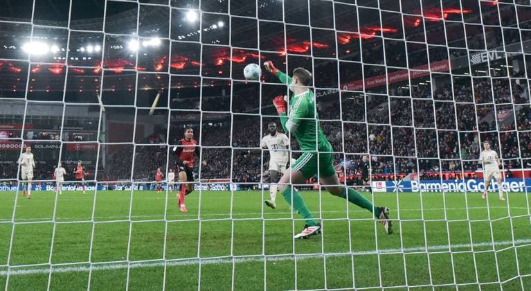 15.02.2025, xblx, Fussball 1.Bundesliga, Bayer 04 Leverkusen - FC Bayern München v.l. Amine Adli (Bayer Leverkusen), Manuel Neuer (FC Bayern Muenchen) (DFL DFB REGULATIONS PROHIBIT ANY USE OF PHOTOGRAPHS as IMAGE SEQUENCES and or QUASI-VIDEO) Leverkusen