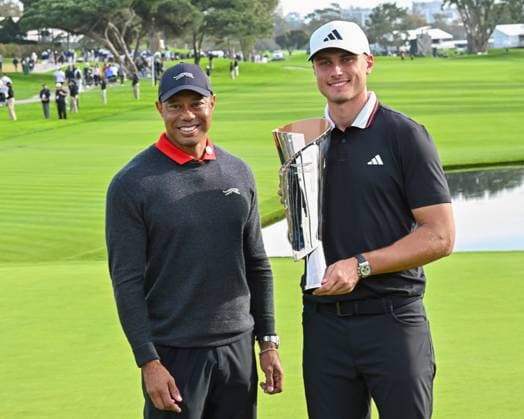 February 16, 2025: Tiger Woods with Ludvig Aberg as he holds the championship trophy after winning the Genesis Invitational on Torrey Pines South Course in San Diego, California. CSM San Diego USA - ZUMAc04_ 20250216_zma_c04_030 Copyright: xJustinxFinex