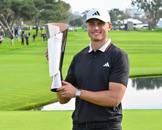February 16, 2025: Ludvig Aberg holds the championship trophy after winning the Genesis Invitational on Torrey Pines South Course in San Diego, California. CSM San Diego USA - ZUMAc04_ 20250216_zma_c04_046 Copyright: xJustinxFinex