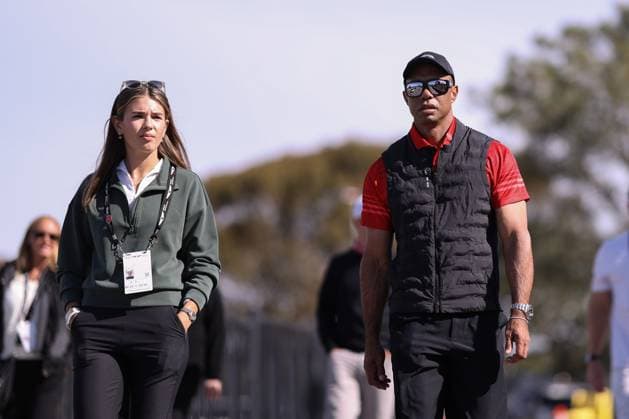 February 16, 2025, La Jolla, California, USA: Golfer KAI TRUMP, granddaughter of President DONALD TRUMP, and tournament host TIGER WOODS walk towards the clubhouse during the final round of the 2025 Genesis Invitational at Torrey Pines Golf Course in La Jolla, California. La Jolla USA - ZUMAt158 20250216_zsp_t158_024 Copyright: xBrentonxTsex