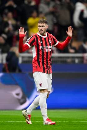 AC Milan v Feyenoord - UEFA Champions League Santiago Gimenez of AC Milan reacts after scoring a goal during the UEFA Champions League 2024 25 knockout phase play-off second leg football match between AC Milan and Feyenoord. Milan Italy Copyright: xNicolòxCampox
