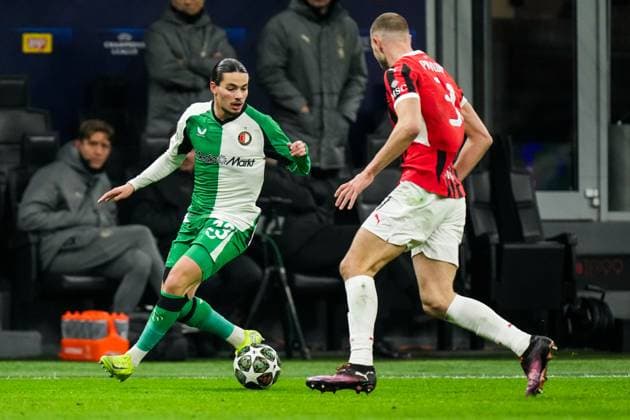 UEFA Champions League: AC Milan v Feyenoord Milan - Anis Hadj Moussa of Feyenoord, Strahinja Pavlovic of AC Milan during the 2nd leg of the knockout phase play-offs of new format of the Champions League 2024 2025. The match is set between AC Milan and Feyenoord at Giuseppe Meazza San Siro on 18 February 2025 in Milan, Italy. Copyright: xYannickxVerhoevenx