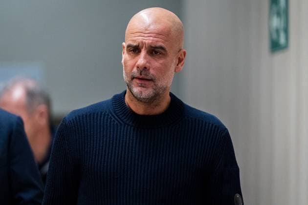 UEFA Champions League 2024 25 League Knockout Play-off Second Leg: Manchester City press conference, PK, Pressekonferenz Pep Guardiola, head coach of Manchester City FC, seen getting into the press room during the UEFA Champions League 2024 25 League Knockout Play-off Second Leg Press Conference at Estadio Santiago Bernabeu on February 18, 2025 in Madrid, Spain. Madrid Estadio Santiago Bernabeu Madrid Spain Copyright: xAlbertoxGardinx AGardin_20250218_Man_City_Press_0109