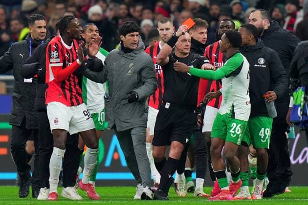 referee Szymon Marciniak , Feyenoord s Givairo Read during the Uefa Champions League soccer match between Ac Milan and Feyenoord at the San Siro Stadium in Milan, north Italy - Tuesday , February 18 , 2025. - Soccer .  Copyright: xSpada LaPressex