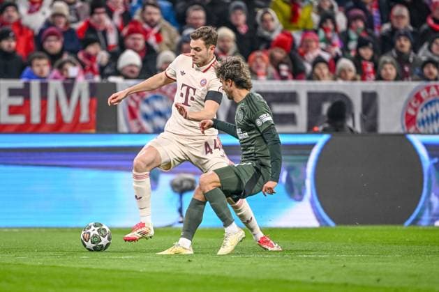 Josip Stanisic (FC Bayern Muenchen) und Jota (Celtic FC) battle for the ball during the UEFA Champions League 2024 25 League Knockout Play-off Second Leg match between FC Bayern München and Celtic FC at Allianz Arena on February 18, 2025 in Munich, Germany. (Photo by Harry Langer DeFodi Images) Defodi-541_FCBCFC0250218_16