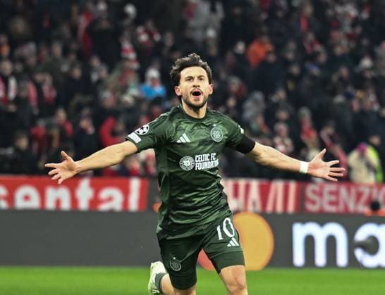 Nicolas Kuhn of Celtic celebrates scoring to give Celtic a 0-1 lead (Agg. 2-2). Bayern Munich v Celtic, UEFA Champions League, Knockout Round Play-offs, Second Leg, Football, Allianz Arena, Munich, Germany - 18 Feb 2025 Editorial use only  Copyright: xUlrichxGamel Shutterstockx 15156608ay