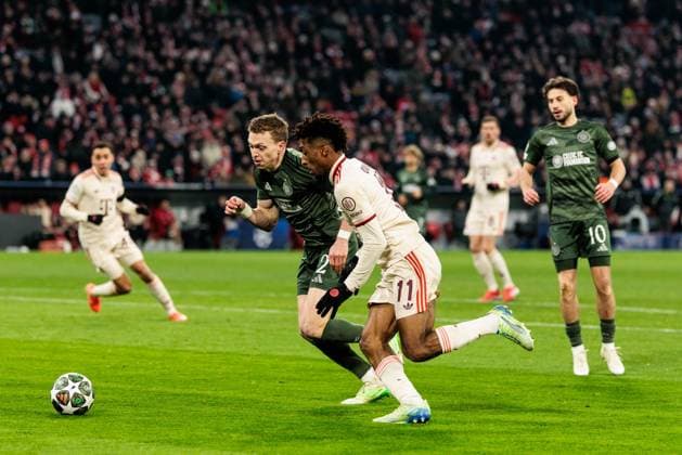 UEFA Champions League: FC Bayern München - Celtic FC; 18.02.2025 Zweikampf Alistair Johnston (Celtic FC, 2), Kingsley Coman (FC Bayern München, 11) UEFA Champions League: FC Bayern München - Celtic FC, München, Allianz Arena am 17.02.2025 Copyright: xBEAUTIFULxSPORTS Wunderlx