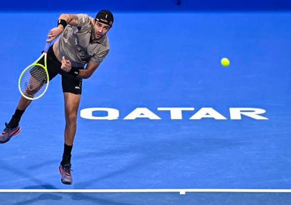 (250219) -- DOHA, Feb. 19, 2025 -- Matteo Berrettini of Italy serves during the men s singles round 32 match between Matteo Berrettini of Italy and Novak Djokovic of Serbia at the ATP, Tennis Herren Qatar Open tennis tournament in Doha, Qatar, on Feb. 18, 2025. (Photo by Xinhua) (SP)QATAR-DOHA-TENNIS-ATP QATAR OPEN 2025-MEN S SINGLES Nikku 