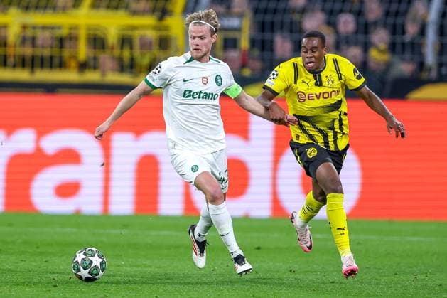 19.02.2025, Fußball, UEFA Champions League, Borussia Dortmund - Sporting Lissabon, Signal Iduna Park, Knockout phase play-offs, Saison 2024 2025: Morten Hjulmand (Sporting 42) im Zweikampf gegen Jamie Gittens (BVB 43) Nordrhein-Westfalen Deutschland