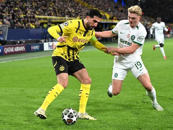 Emre Can (Borussia Dortmund) und Conrad Harder (Sporting Lissabon) im Zweikampf waehrend des Spiels der UEFA Champions League 2024 25 Play-offs Rückspiel zwischen Borussia Dortmund und Sporting Lissabon, SIGNAL IDUNA PARK am 19. February 2025 in Dortmund, Deutschland. (Foto von Ralf Treese DeFodi Images) +++ Emre Can (Borussia Dortmund) und Conrad Harder (Sporting Lissabon) battle for the ball during the UEFA Champions League 2024 25 League Knockout Play-off Second Leg match between Borussia Dortmund and Sporting Clube de Portugal at Signal Iduna Park on February 19, 2025 in Dortmund, Germany. (Photo by Ralf Treese DeFodi Images)