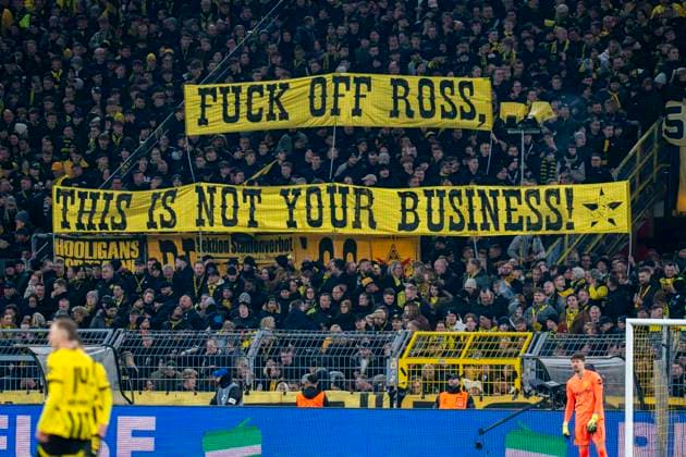 19.02.2025, Borussia Dortmund vs. Sporting Lissabon, UEFA Champions League, Playoff-Rückspiel Die Dortmunder Fans auf der Südtribüne zeigen ein Banner mit der Aufschrift Fuck off Ross, this is not your Business. Wichtiger Hinweis: Gemaess den Vorgaben der UEFA ist es untersagt, in dem Stadion und oder vom Spiel angefertigte Fotoaufnahmen in Form von Sequenzbildern und oder videoaehnlichen Fotostrecken zu verwerten bzw. verwerten zu lassen. Copyright: xBahhoxKarax