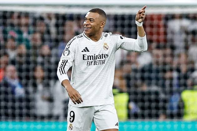 Kylian MbappÃ of Real Madrid celebrates scoring the opening goal for their side Real Madrid v Manchester City, UEFA Champions League, Knockout Round Play-offs, Second Leg, Football, Santiago BernaboÆ?Ã?Æ?o Ã? u, Madrid, Spain - 19 Feb 2025 EDITORIAL USE ONLY No use with unauthorised audio, video, data, fixture lists, club league logos or live services. Online in-match use limited to 120 images, no video emulation. No use in betting, games or single club league player publications.  Copyright: xRubenxAlbarran Shutterstockx 15137179f