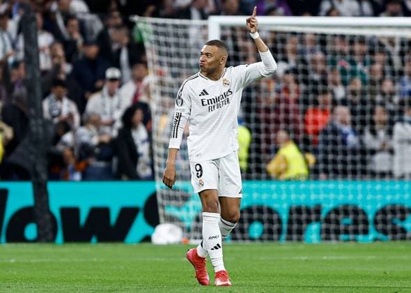 Kylian MbappÃ of Real Madrid celebrates scoring the opening goal for their side Real Madrid v Manchester City, UEFA Champions League, Knockout Round Play-offs, Second Leg, Football, Santiago BernaboÆ?Ã?Æ?o Ã? u, Madrid, Spain - 19 Feb 2025 EDITORIAL USE ONLY No use with unauthorised audio, video, data, fixture lists, club league logos or live services. Online in-match use limited to 120 images, no video emulation. No use in betting, games or single club league player publications.  Copyright: xRubenxAlbarran Shutterstockx 15137179j