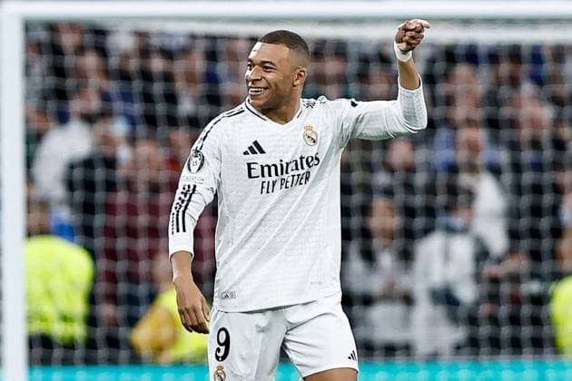 Kylian MbappÃ of Real Madrid celebrates scoring the opening goal for their side Real Madrid v Manchester City, UEFA Champions League, Knockout Round Play-offs, Second Leg, Football, Santiago BernaboÆ?Ã?Æ?o Ã? u, Madrid, Spain - 19 Feb 2025 EDITORIAL USE ONLY No use with unauthorised audio, video, data, fixture lists, club league logos or live services. Online in-match use limited to 120 images, no video emulation. No use in betting, games or single club league player publications.  Copyright: xRubenxAlbarran Shutterstockx 15137179i