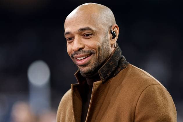 Thierry Henry performs media duties for CBS Real Madrid v Manchester City, UEFA Champions League, Knockout Round Play-offs, Second Leg, Football, Santiago BernaboÆ?Ã?Æ?o Ã? u, Madrid, Spain - 19 Feb 2025 EDITORIAL USE ONLY No use with unauthorised audio, video, data, fixture lists, club league logos or live services. Online in-match use limited to 120 images, no video emulation. No use in betting, games or single club league player publications.  Copyright: xRubenxAlbarran Shutterstockx 15137179r